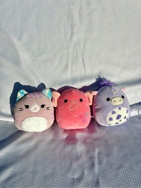 Squishmallows pink Elephant, purple Horse, and light pink Cat